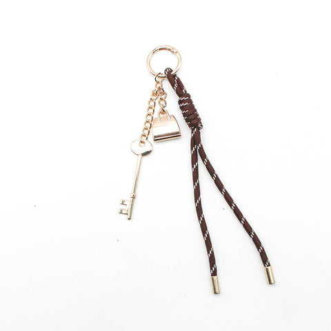 Chaveiro com chave dourada vintage e mini bolsa - Gallantry